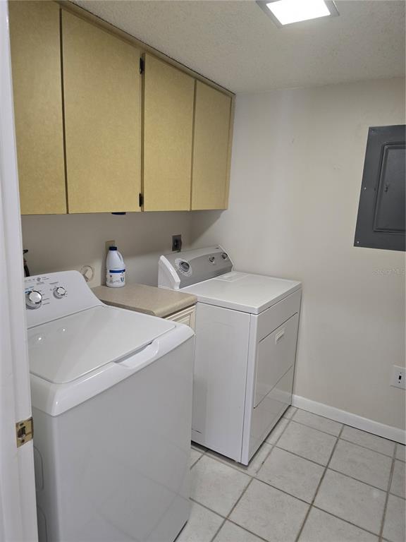 411 South Bayshore Boulevard, Unit 1 Safety Harbor, FL 34695 - Photo 13 of 30 a utility room with dryer and washer