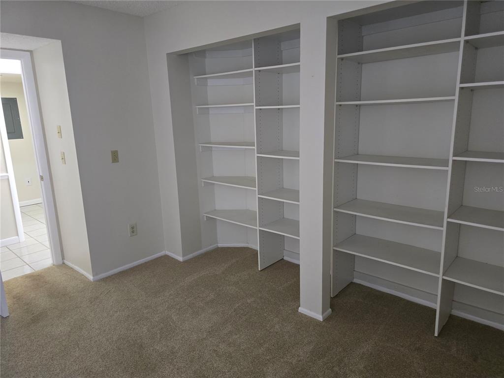 411 South Bayshore Boulevard, Unit 1 Safety Harbor, FL 34695 - Photo 15 of 30 a view of an empty room with empty racks