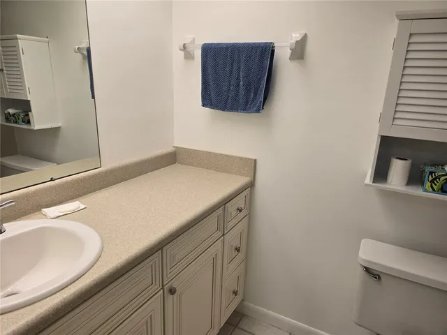a bathroom with a sink and a toilet