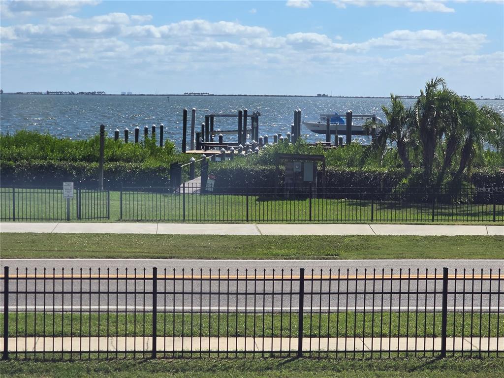 411 South Bayshore Boulevard, Unit 1 Safety Harbor, FL 34695 - Photo 6 of 30 a view of a yard and a view of a city