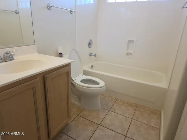 a bathroom with a sink a toilet and a bathtub