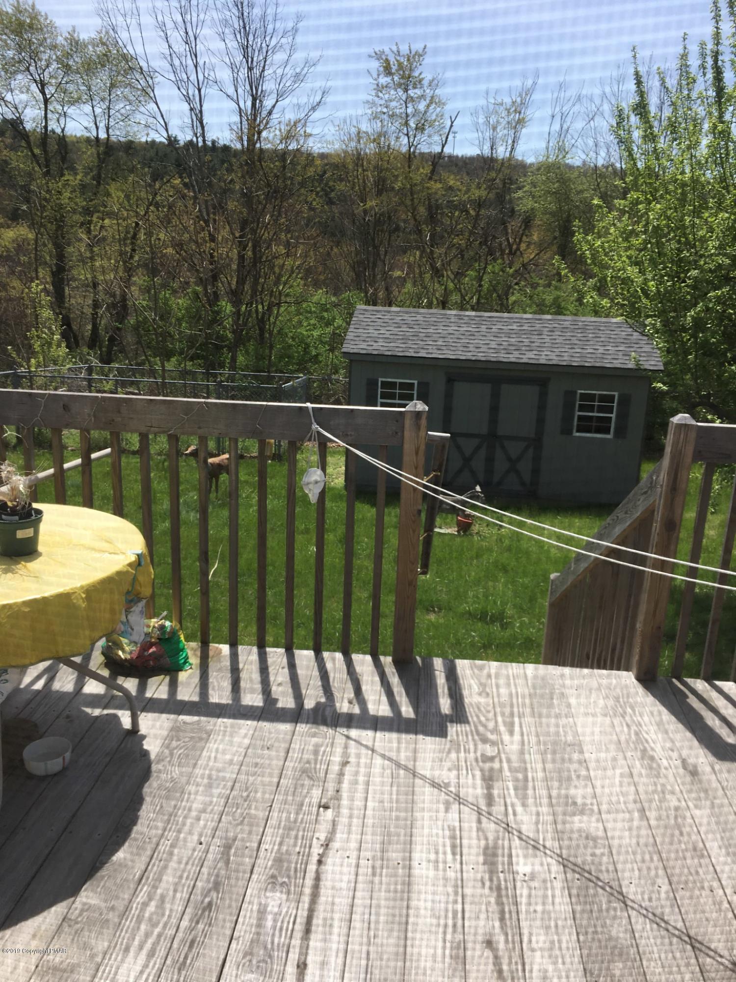 522 Kunkletown Road Kunkletown, PA 18058 - Photo 11 of 15 a view of a balcony with two chairs