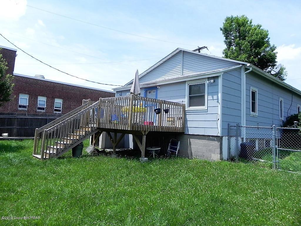 522 Kunkletown Road Kunkletown, PA 18058 - Photo 15 of 15 a view of a house with a yard and deck