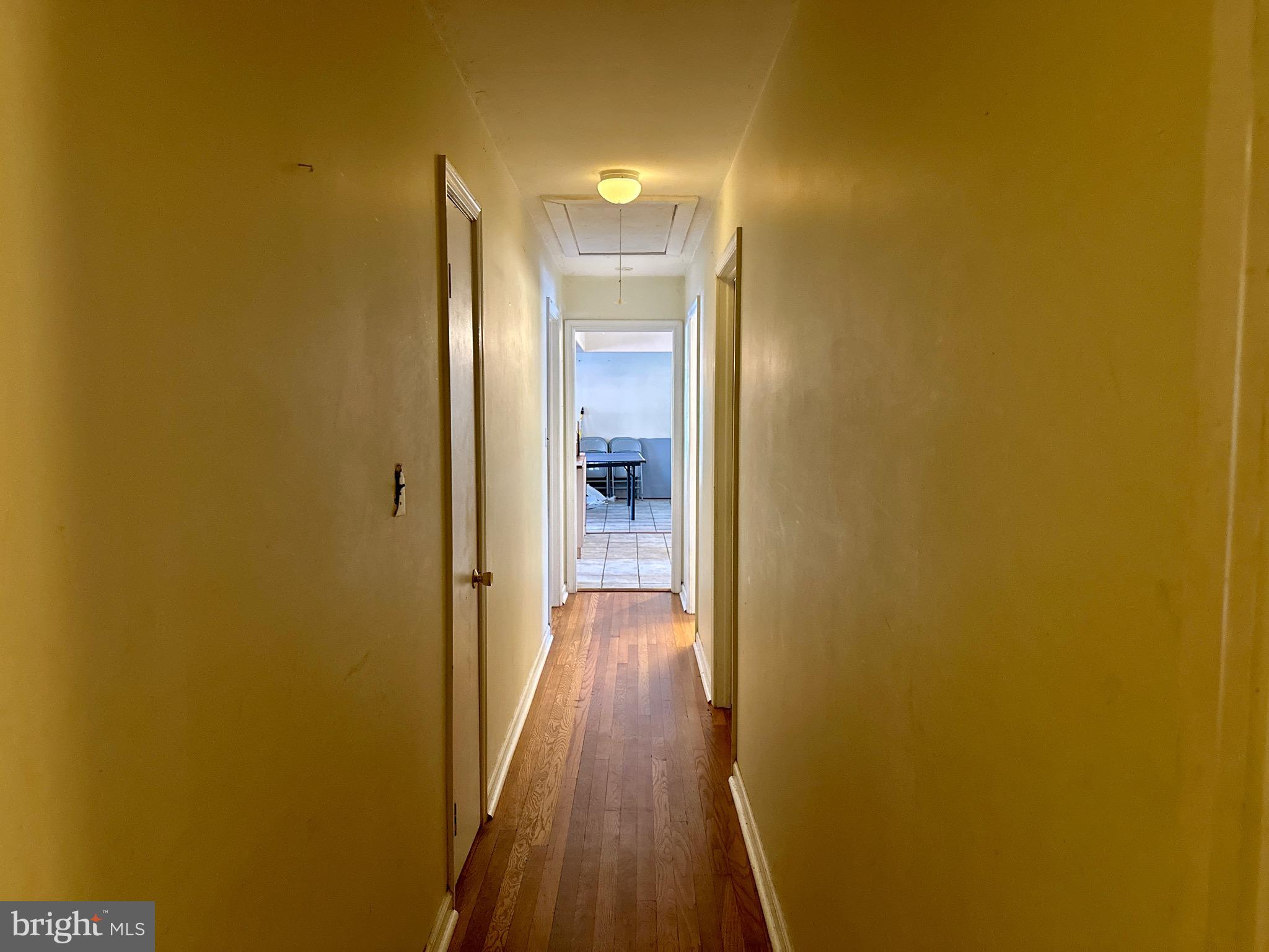 3675 Seaman Road Preston, MD 21655 - Photo 11 of 35 a view of a hallway with wooden floor