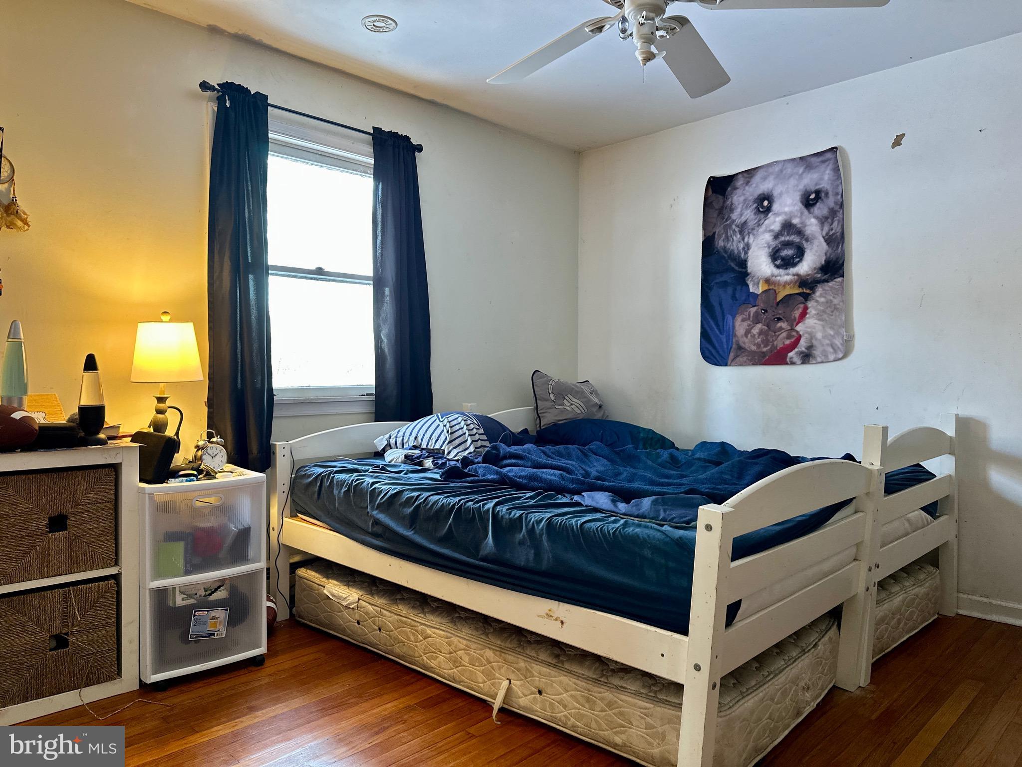 3675 Seaman Road Preston, MD 21655 - Photo 12 of 35 a bed room with a bed and a window