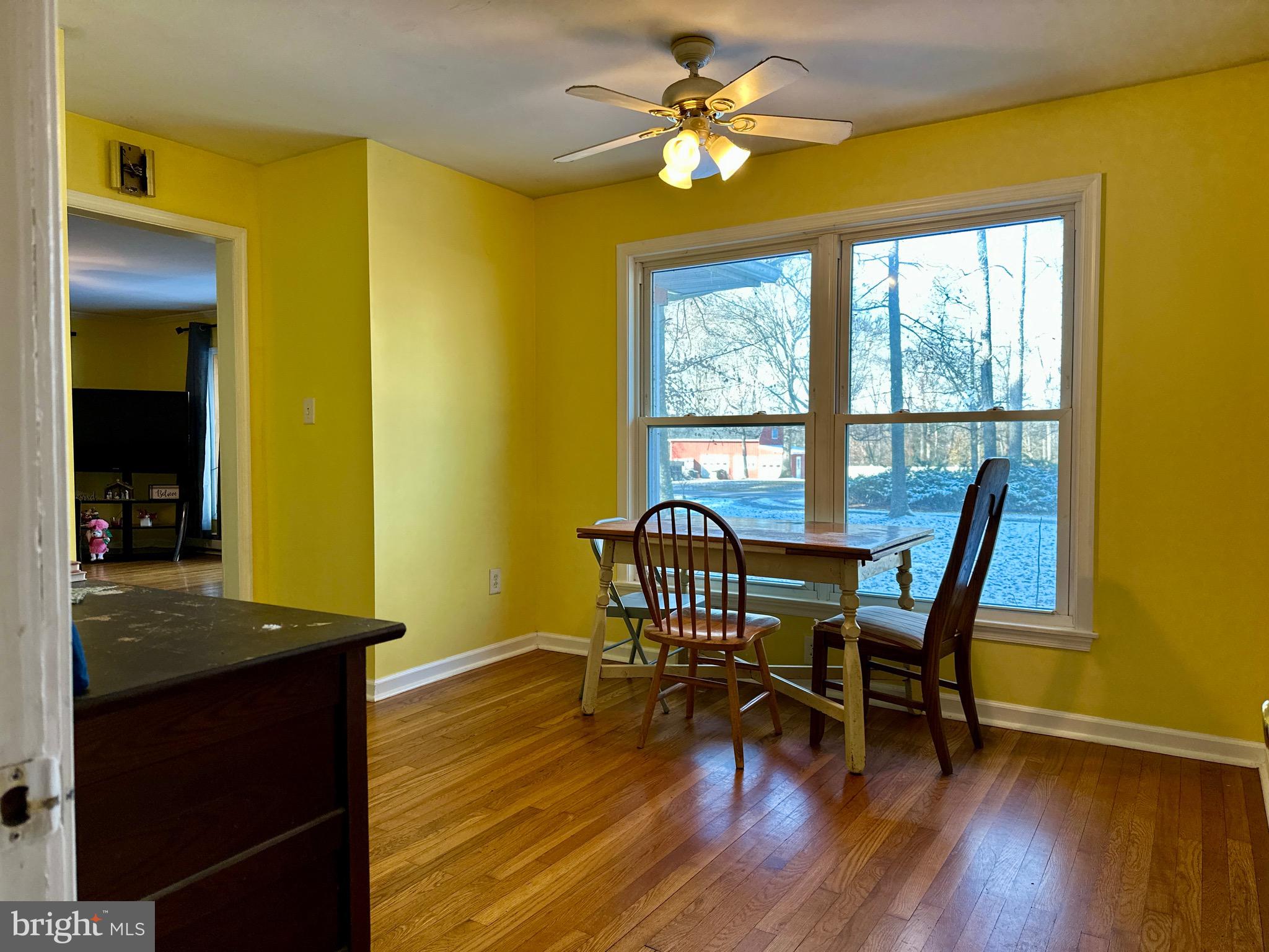 3675 Seaman Road Preston, MD 21655 - Photo 14 of 35 a view of a dining room with furniture and wooden floor