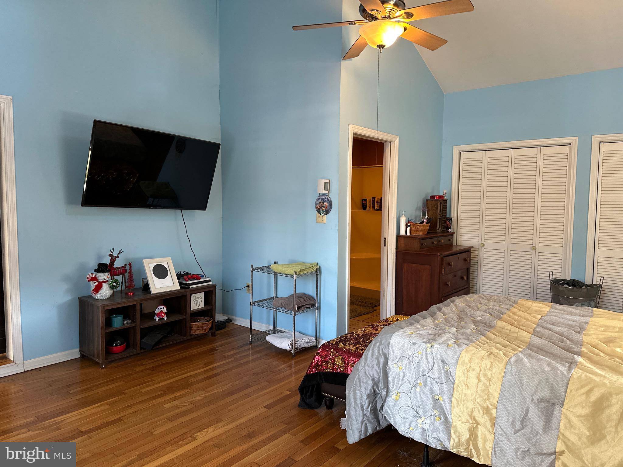 3675 Seaman Road Preston, MD 21655 - Photo 21 of 35 a bedroom with a bed and a flat screen tv