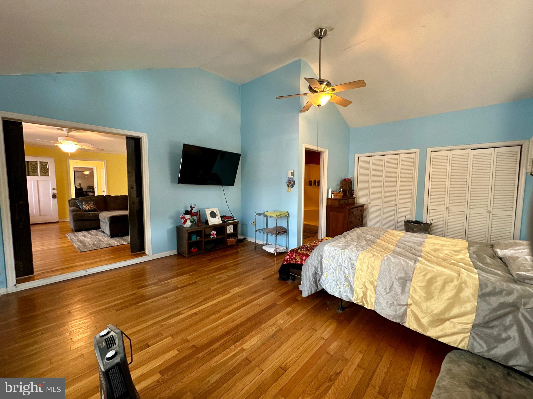 3675 Seaman Road Preston, MD 21655 - Photo 22 of 35 a bedroom with bed and glass door