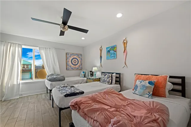 a living room with furniture a dining table and kitchen view