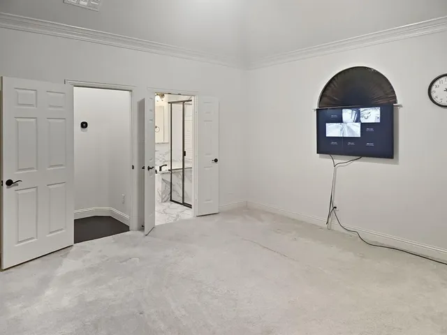 a view of empty room with front door