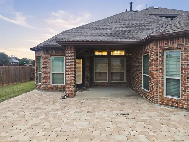 a view of an chairs and tables in the patio