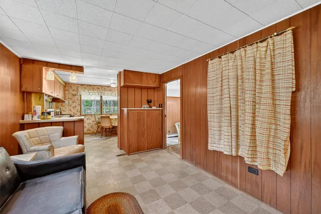 a view of a living room filled with furniture