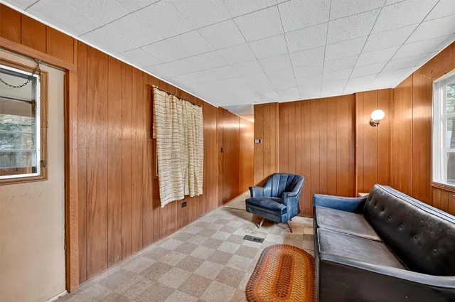 a room with furniture and window