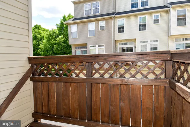 a view of a wooden fence