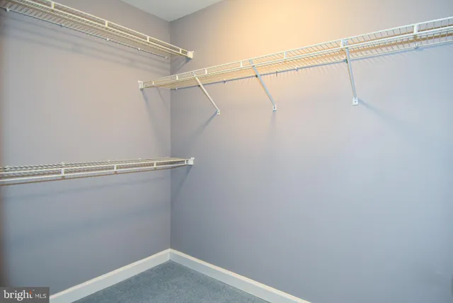 a view of a room with racks on the wall
