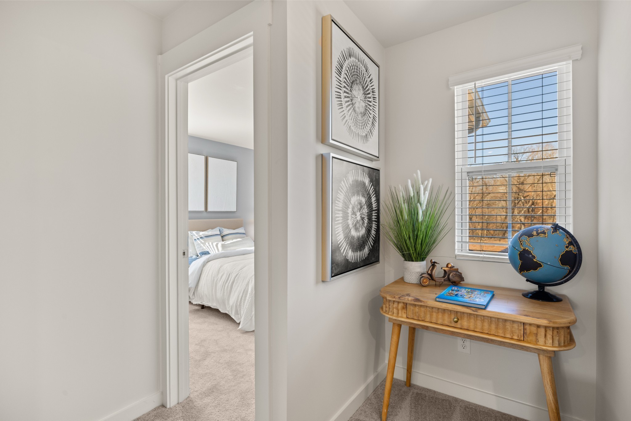 1517 Cherry Tree Lane Mount Juliet, TN 37122 - Photo 40 of 56 a view of a room that has a bed and a potted plant