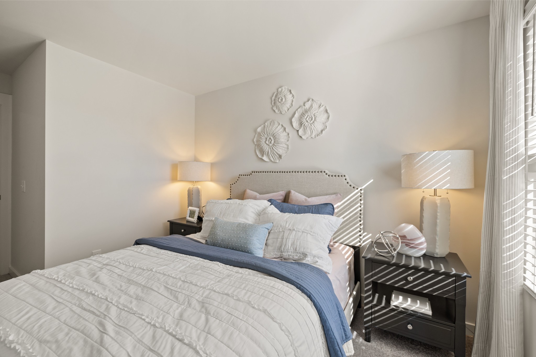 1517 Cherry Tree Lane Mount Juliet, TN 37122 - Photo 52 of 56 a bedroom with a bed and a painting on the wall