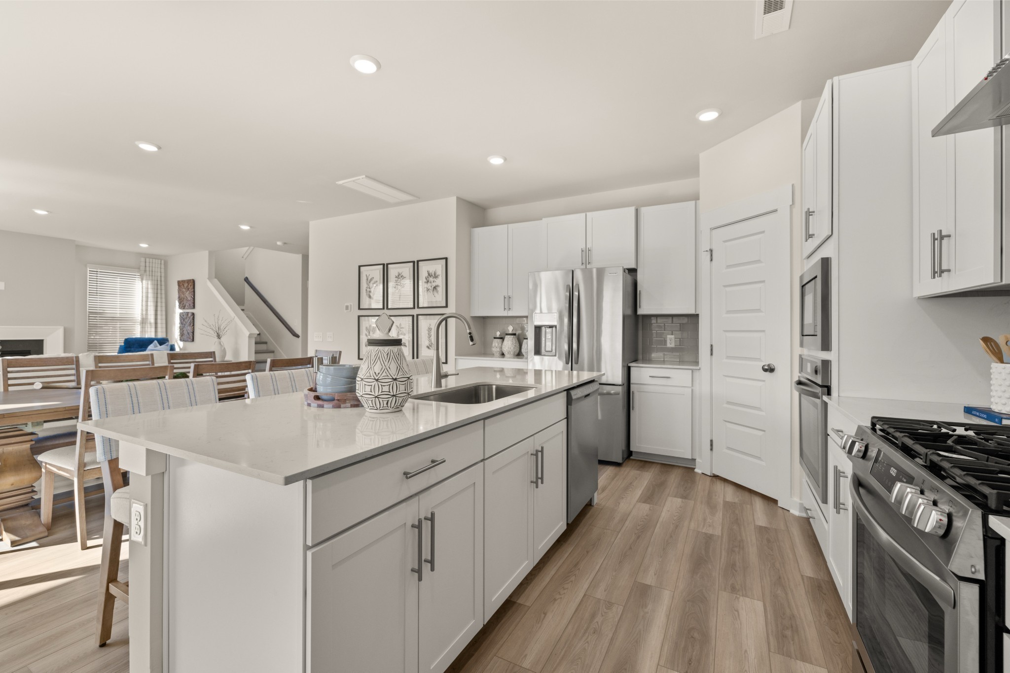 1517 Cherry Tree Lane Mount Juliet, TN 37122 - Photo 9 of 56 a kitchen with stainless steel appliances granite countertop a sink stove and refrigerator