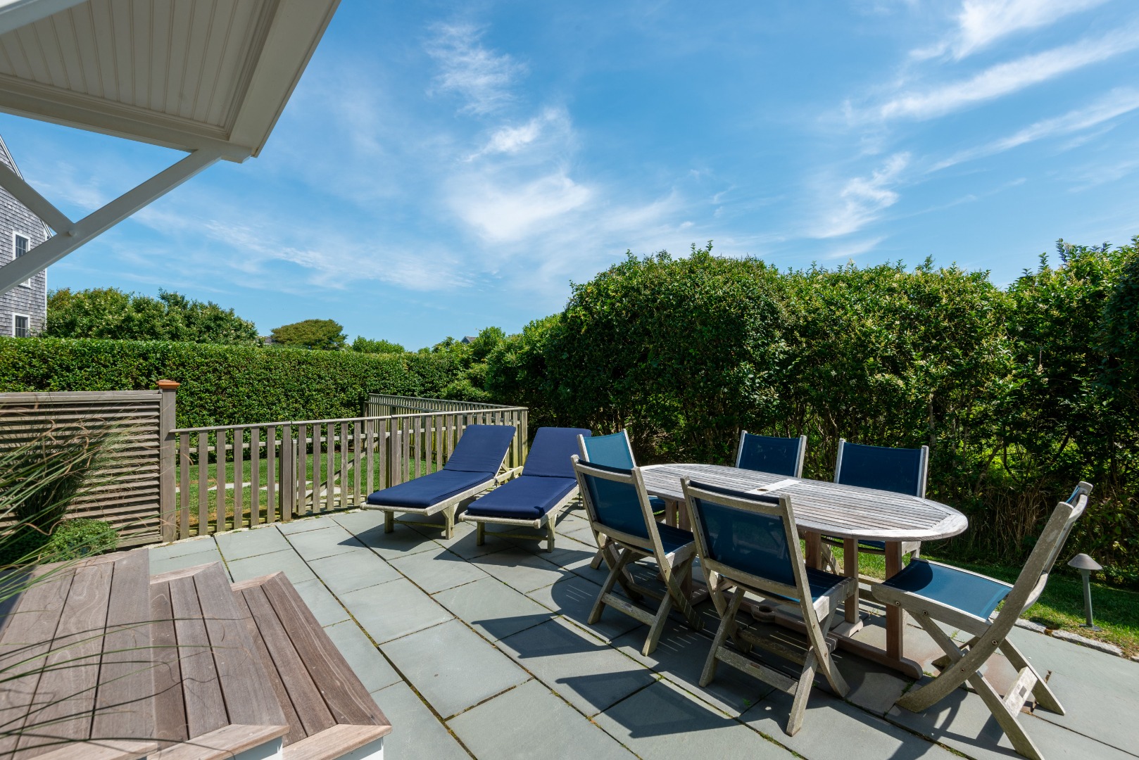 34 Bosworth Road Nantucket, MA 02554 - Photo 13 of 38 a view of a chairs and table on the terrace