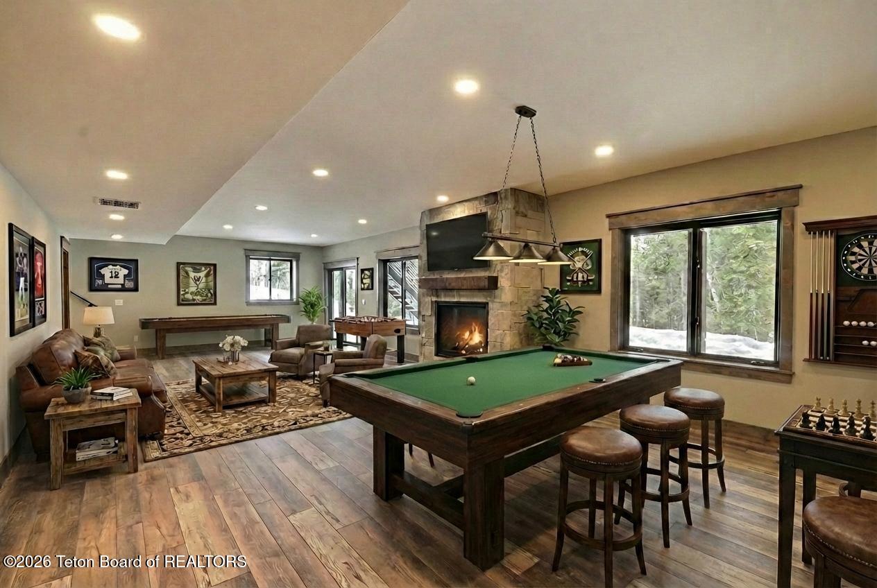 5727 Forest Ridge Road Victor, ID 83455 - Photo 14 of 76 Downstairs Game Room - Virtual Staging