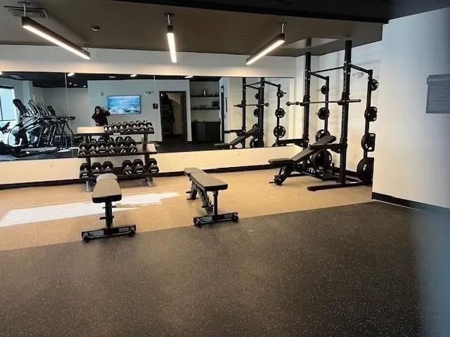 a view of a room with gym equipment
