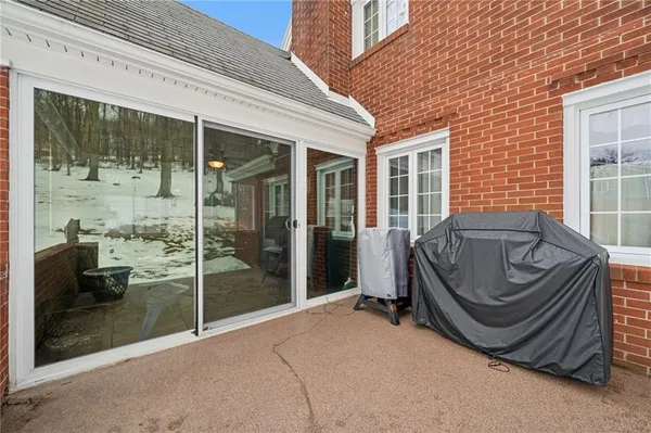 a room with furniture and shower
