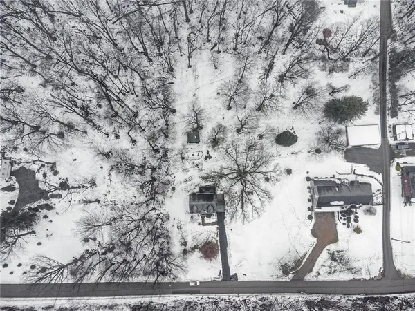 a view of a backyard of the house