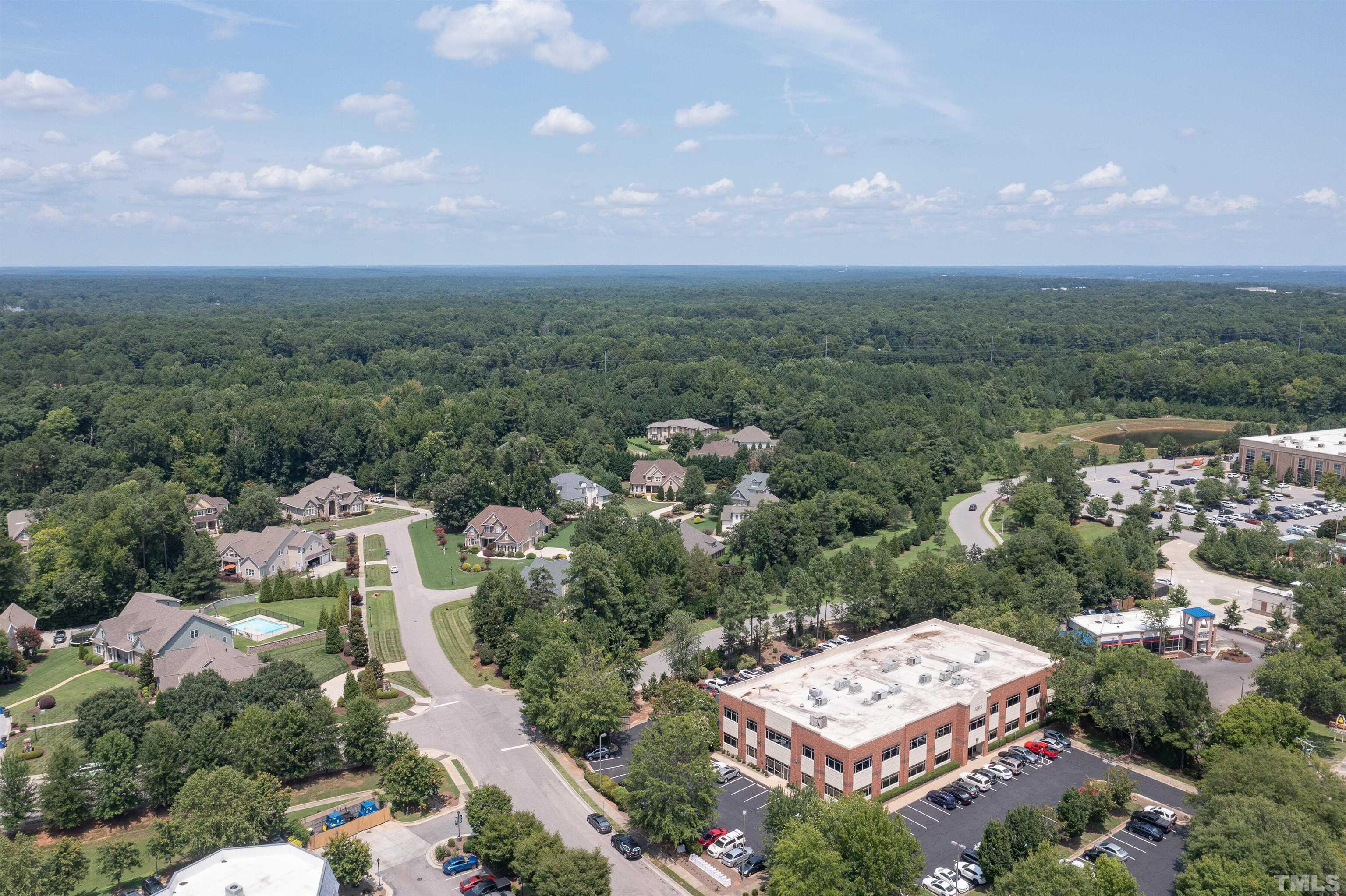 8313 Rue Cassini Court Raleigh, NC 27615 - Photo 59 of 74 an aerial view of multiple house