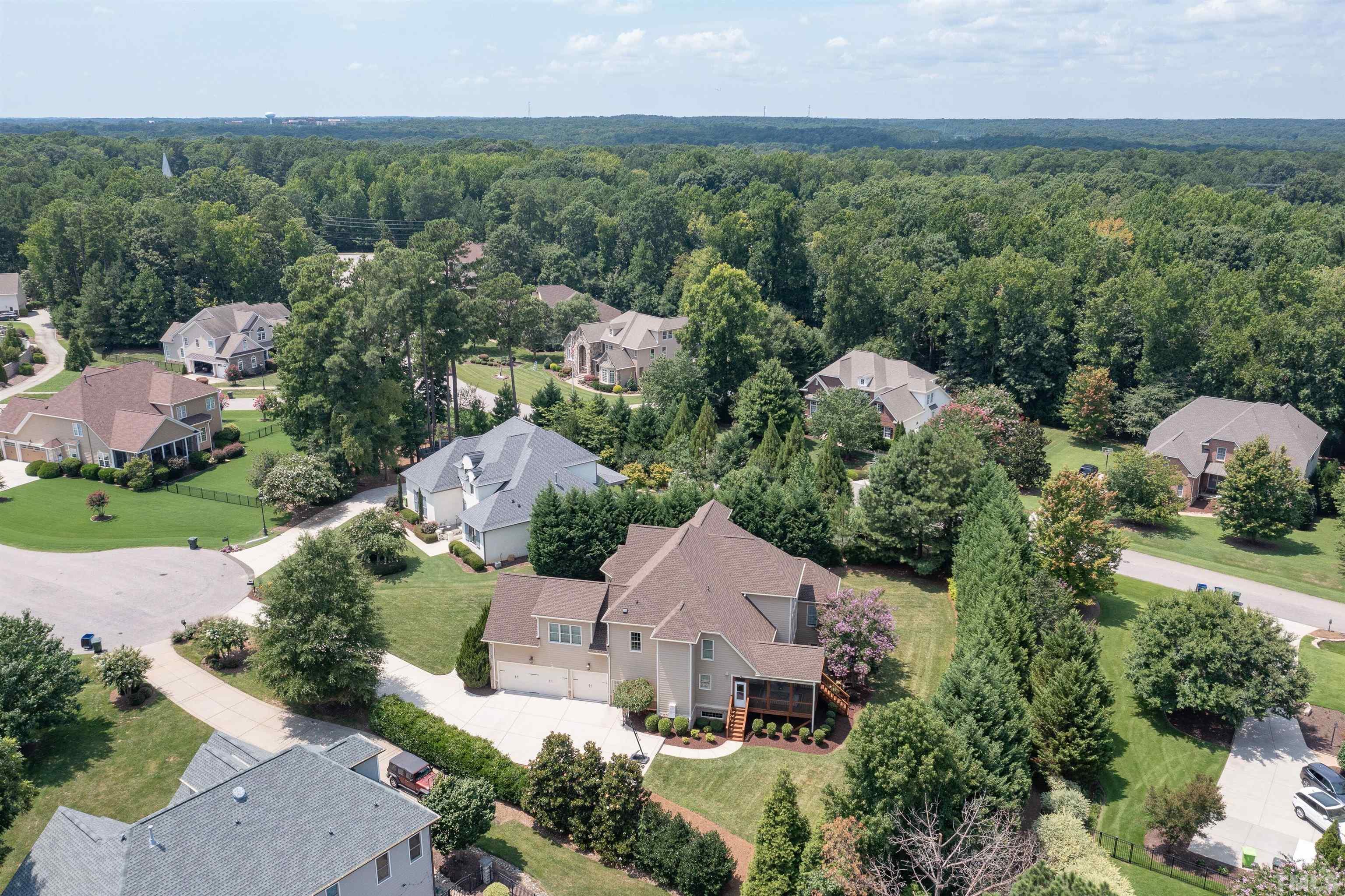 8313 Rue Cassini Court Raleigh, NC 27615 - Photo 65 of 74 an aerial view of a house with outdoor space and street view