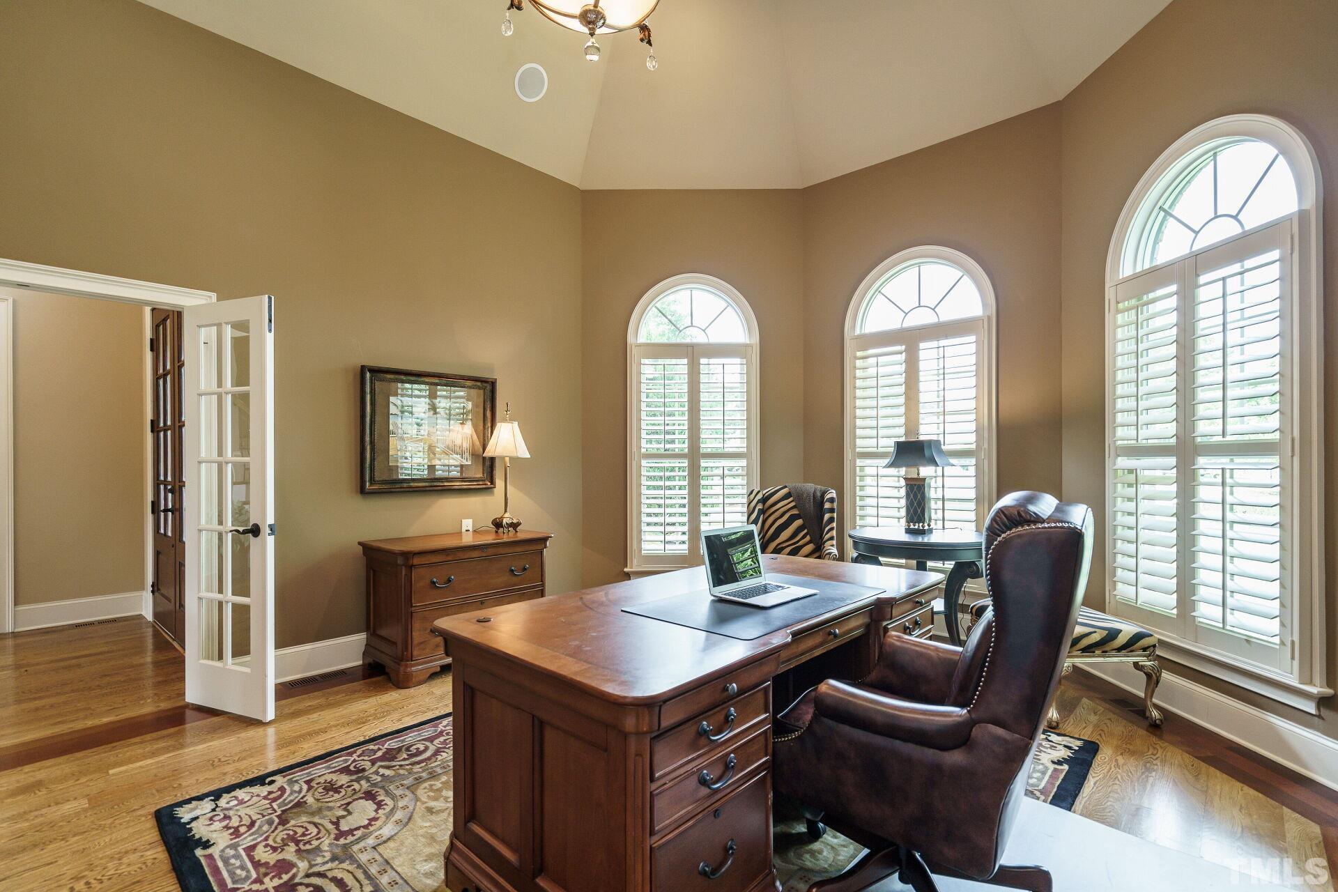 8313 Rue Cassini Court Raleigh, NC 27615 - Photo 9 of 74 a view of a livingroom with furniture and window