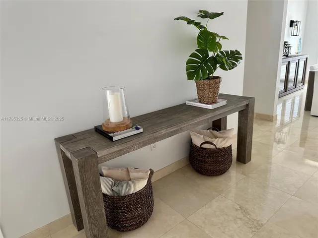 a vase of flowers sitting on a table