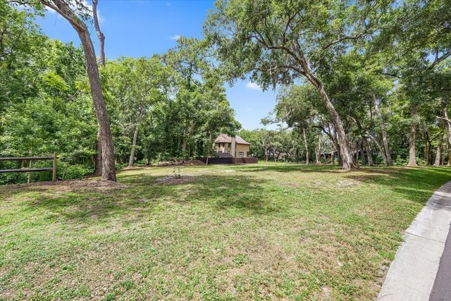 a view of outdoor space with deck and garden