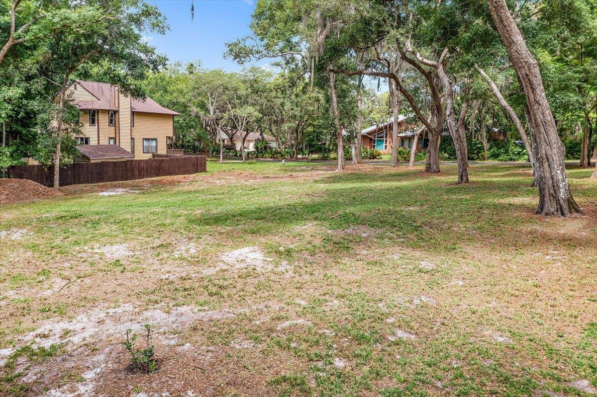 701 Camelia Trail St. Augustine, FL 32086 - Photo 13 of 16 a view of house with outdoor space and garden