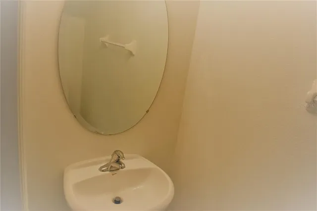 a view of a brick house with a large window