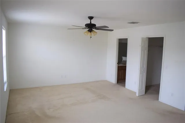 a bathroom with a toilet and a sink