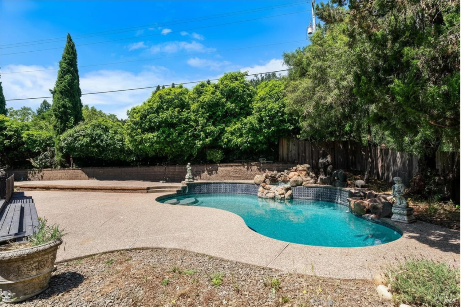 715 Placer Court Santa Rosa, CA 95401 - Photo 27 of 37 a view of a swimming pool with a sitting area