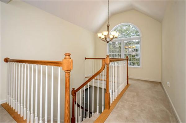 549 Potter Road Framingham, MA 01701 - Photo 12 of 22 a view of a livingroom with wooden floor stairs