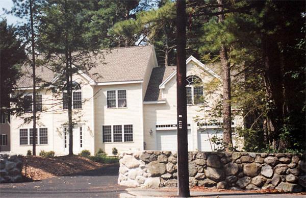 549 Potter Road Framingham, MA 01701 - Photo 22 of 22 a front view of a house with a tree