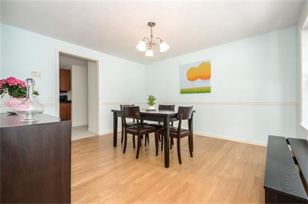 549 Potter Road Framingham, MA 01701 - Photo 6 of 22 a view of a dining room with furniture and wooden floor