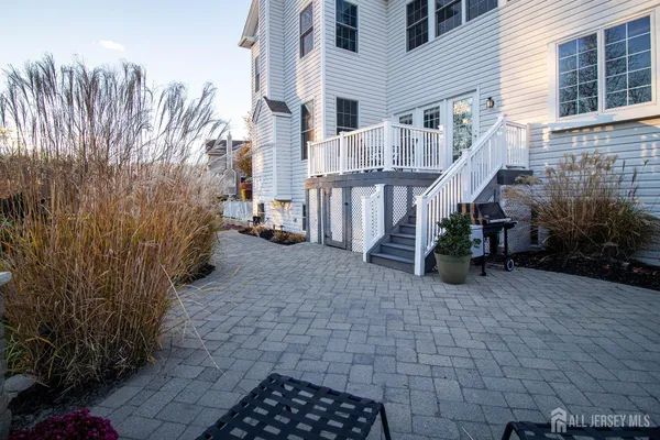 a view of a pathway with a house in front of a house