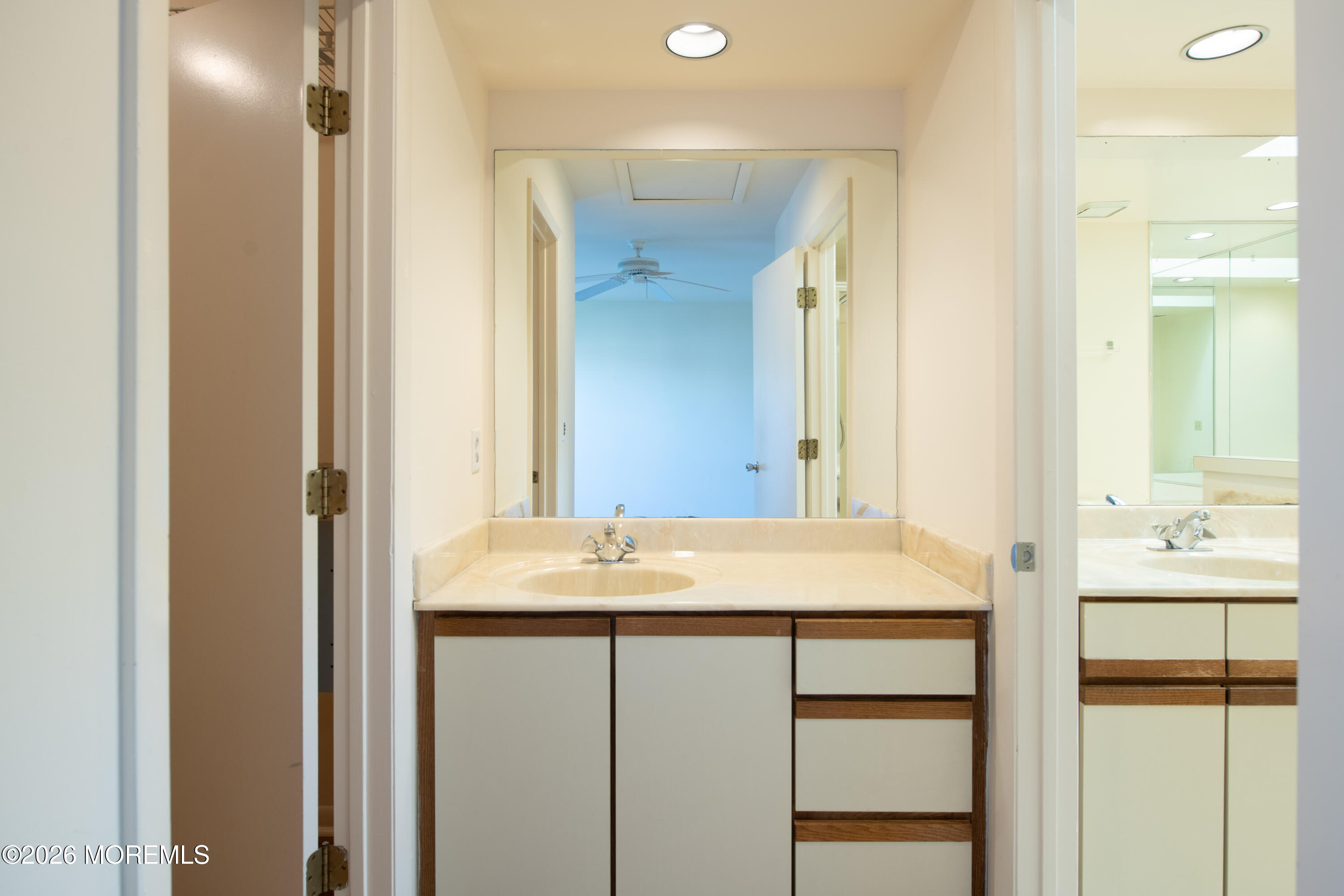10 Seawinds Way Long Branch, NJ 07740 - Photo 18 of 31 a bathroom with a sink and a mirror