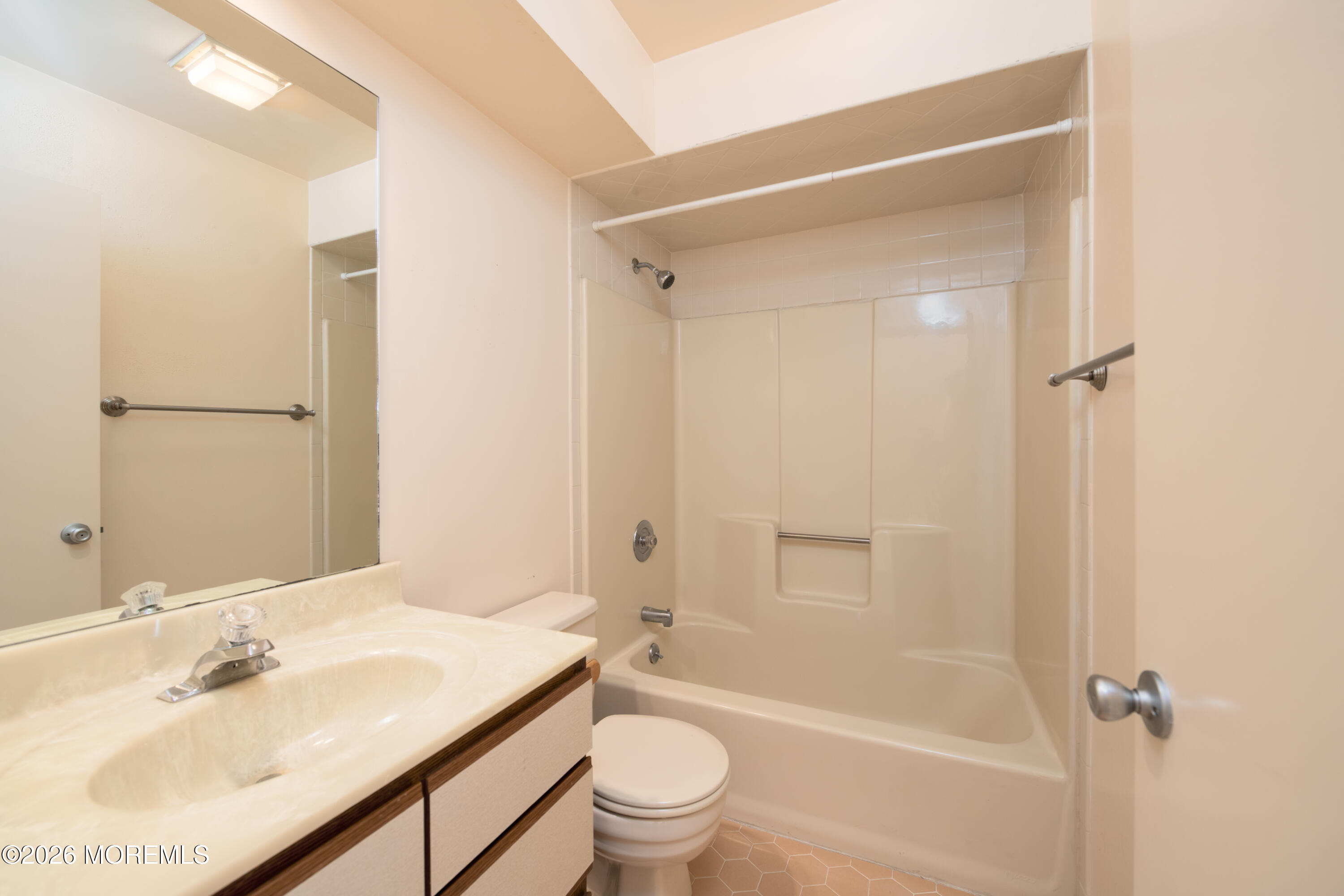 10 Seawinds Way Long Branch, NJ 07740 - Photo 21 of 31 a bathroom with a sink a toilet and shower
