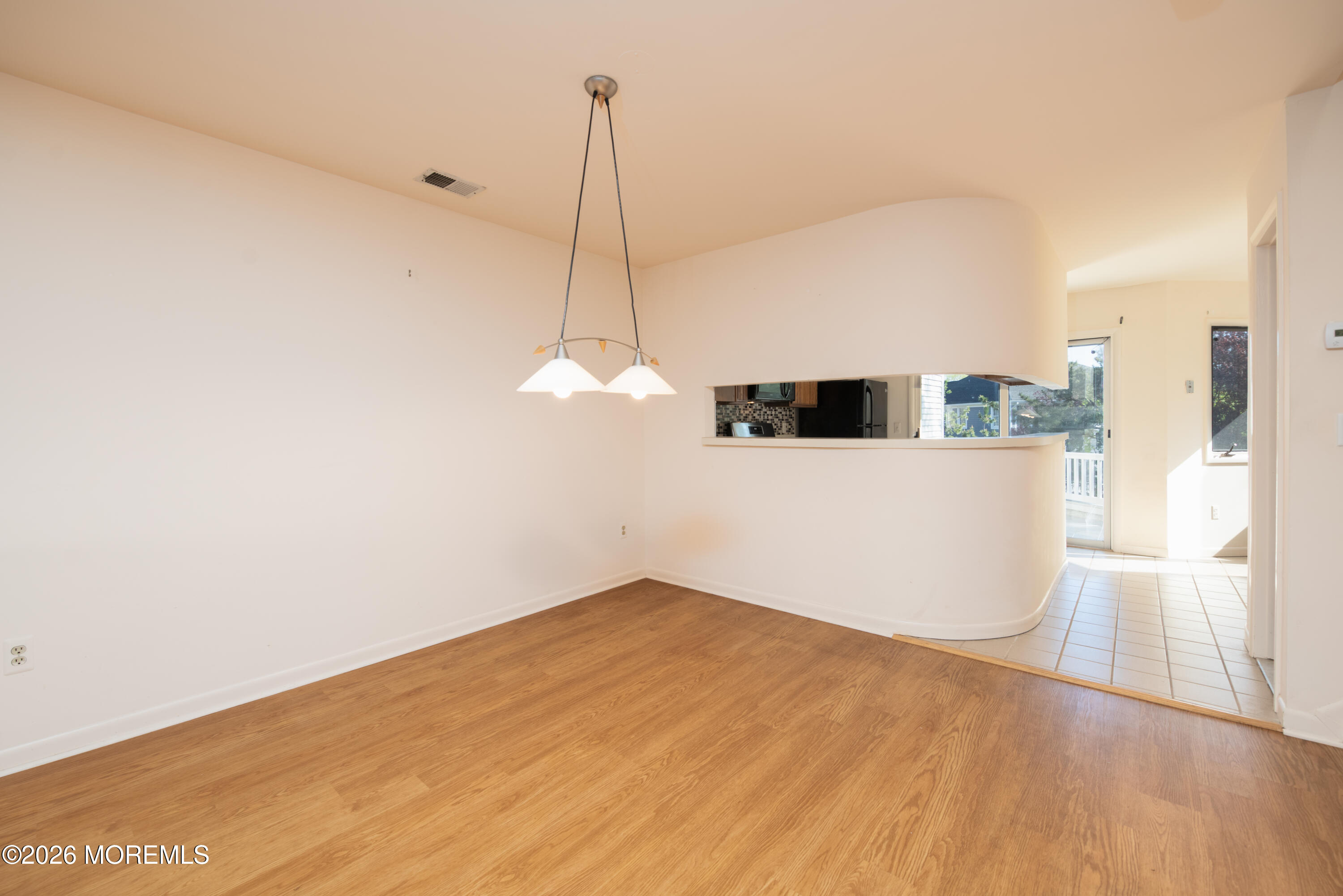 10 Seawinds Way Long Branch, NJ 07740 - Photo 7 of 31 a view of a room with a wooden floor