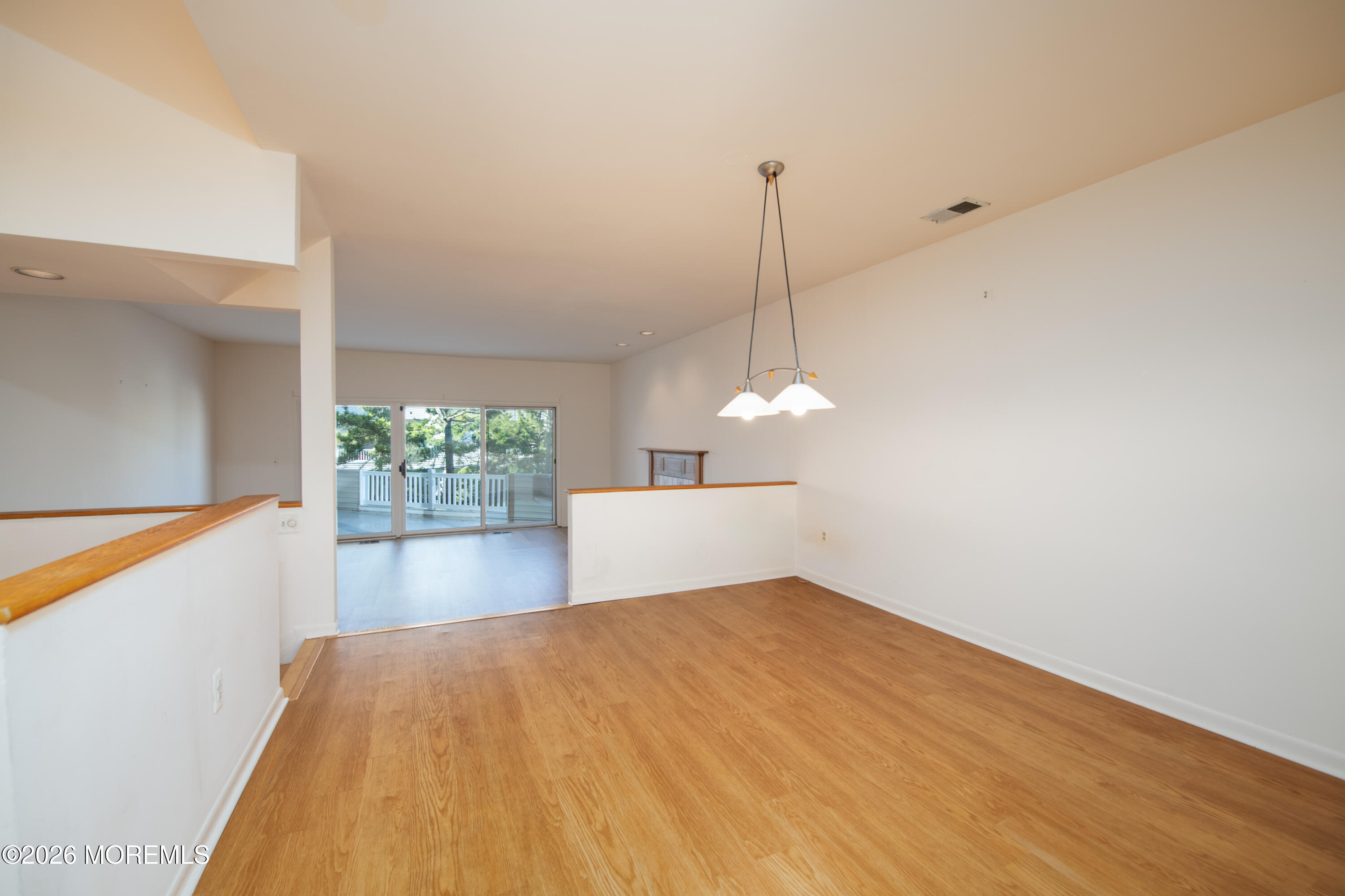 10 Seawinds Way Long Branch, NJ 07740 - Photo 8 of 31 a view of a room with a window and wooden floor