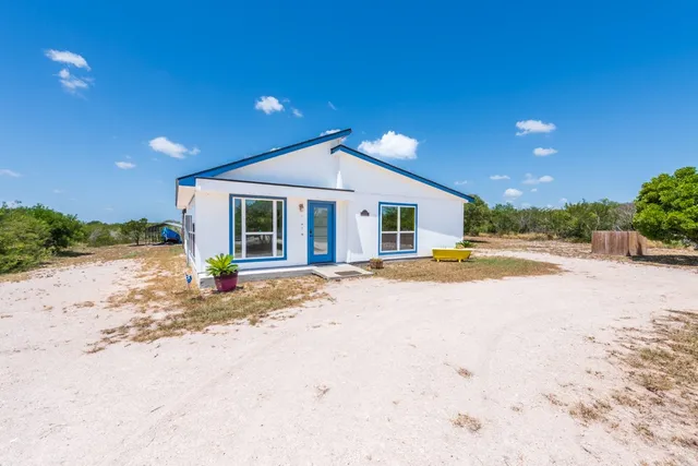 a view of a house with a patio