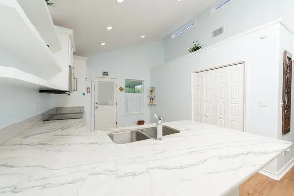 a bathroom with a toilet and shower