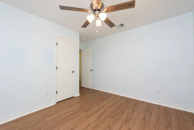 an aerial view of a house with pool outdoor space and seating area