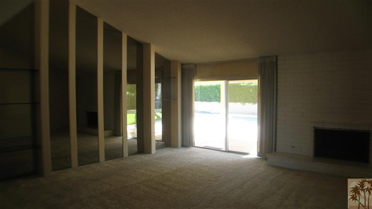 73197 Haystack Road Palm Desert, CA 92260 - Photo 3 of 8 a view of empty room with floor to ceiling window