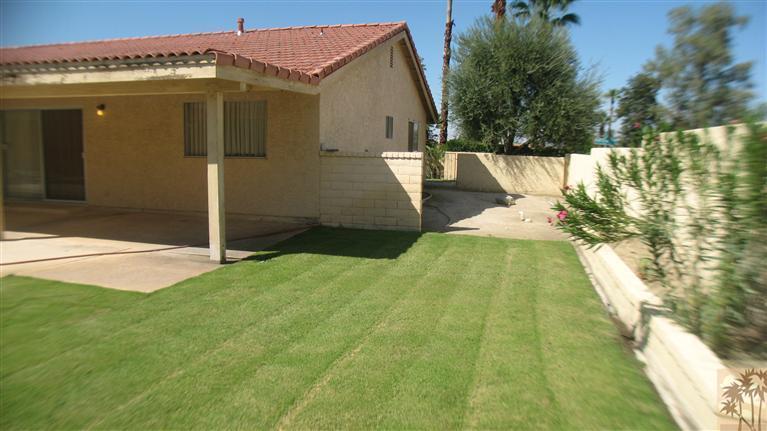 73197 Haystack Road Palm Desert, CA 92260 - Photo 7 of 8 a view of a house with a yard