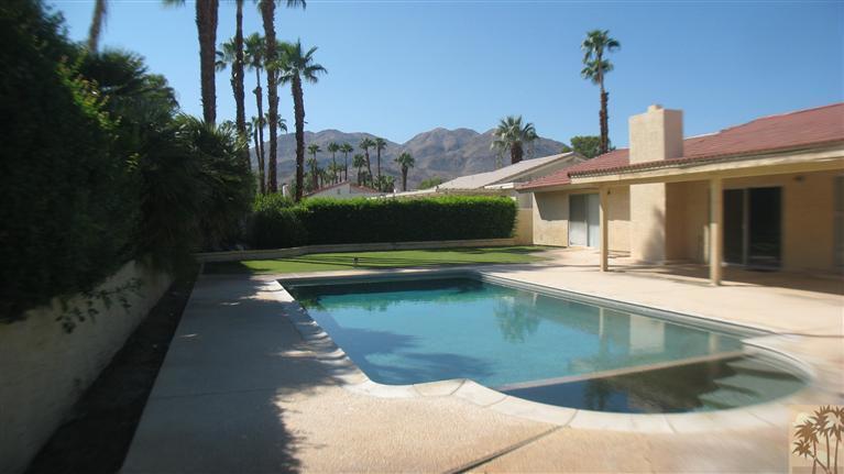 73197 Haystack Road Palm Desert, CA 92260 - Photo 8 of 8 a view of a house with a swimming pool